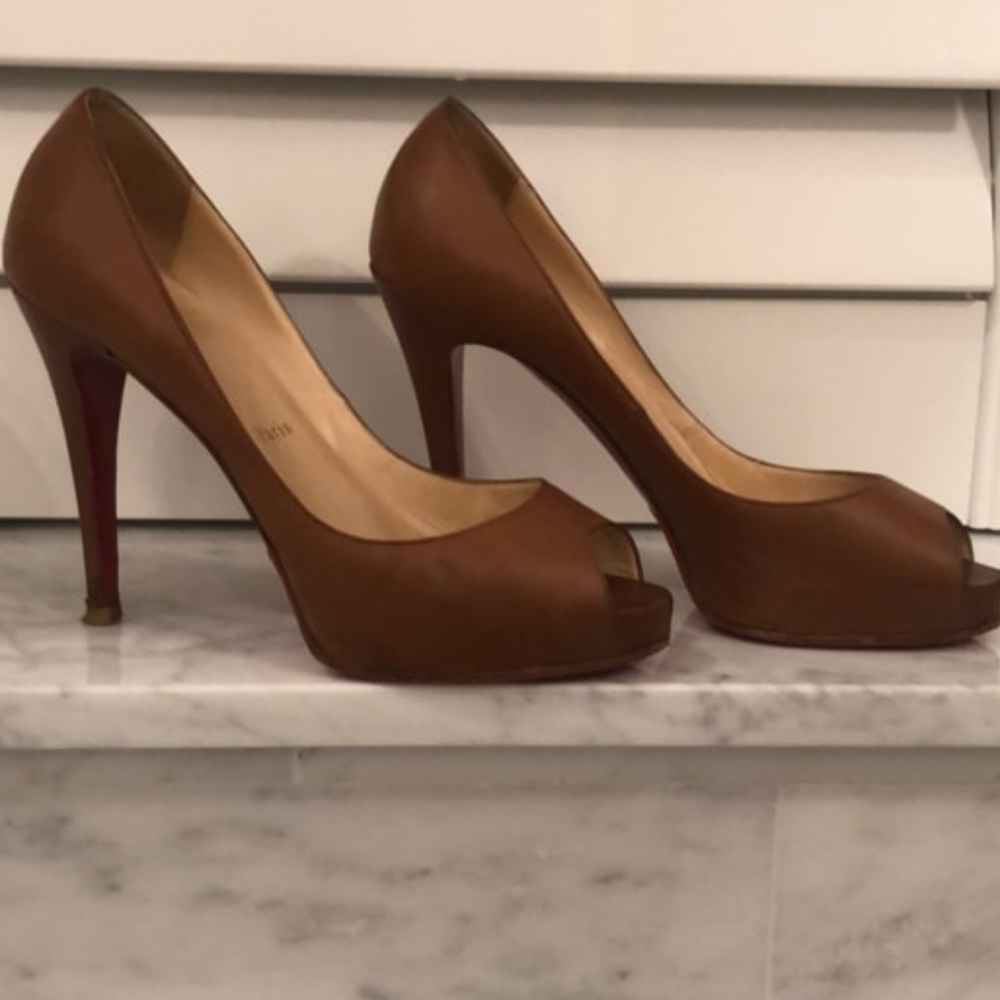 Christian Louboutin Platform Open toe Heels.